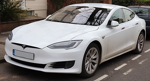 A front three-quarters view of a white 2016 Tesla Model S
